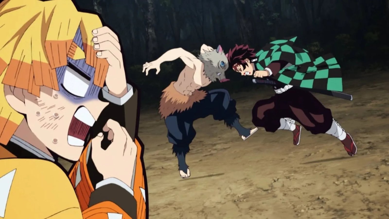 Tanjiro sử dụng đòn húc đầu mạnh mẽ hạ gục Inosuke trong Kimetsu no Yaiba