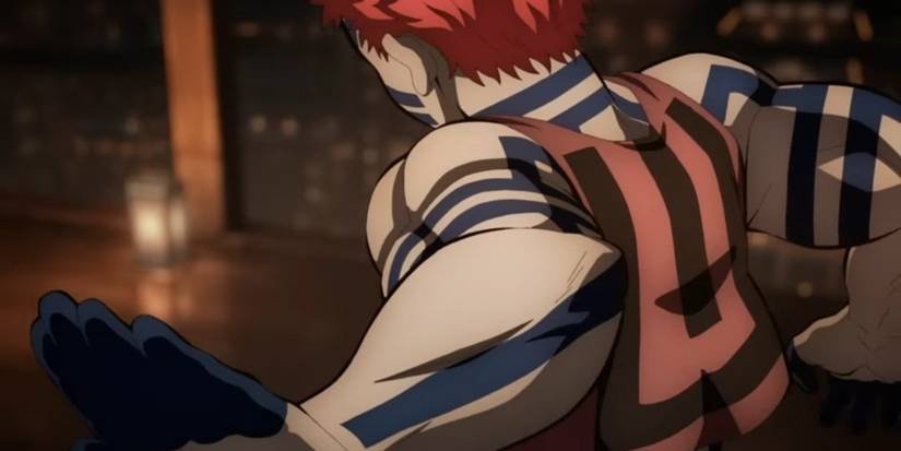 Akaza, Thượng Huyền Tam trong Kimetsu no Yaiba, với trang phục haori đặc trưng và hình xăm trên cơ thể, thể hiện ý nghĩa thiết kế Akaza phức tạp.